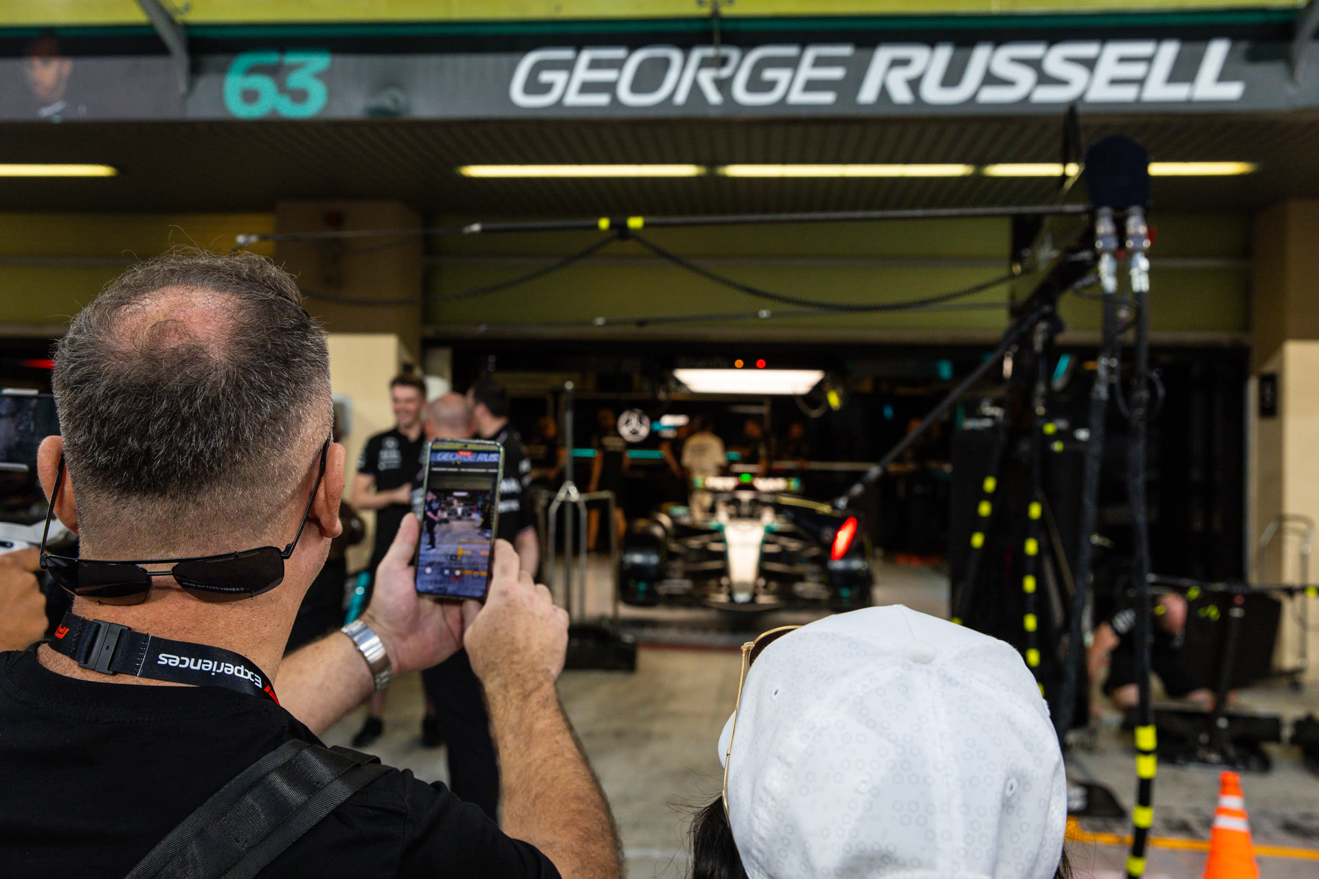 Guests at a team garage on the pit lane at Yas Marina Circuit